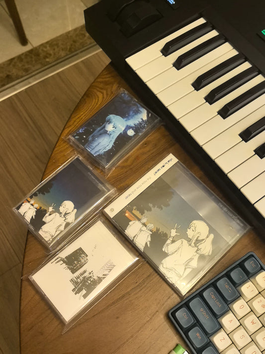 What Is Your Name? – The Now Now And Never – CD & Cassette Collection (1 CD + 3 Cassettes)