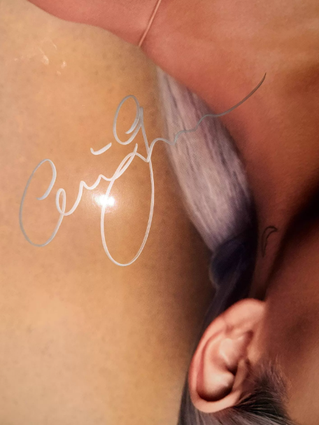 Ariana Grande – Sweetener signed poster (silver signature, from the premiere red carpet)