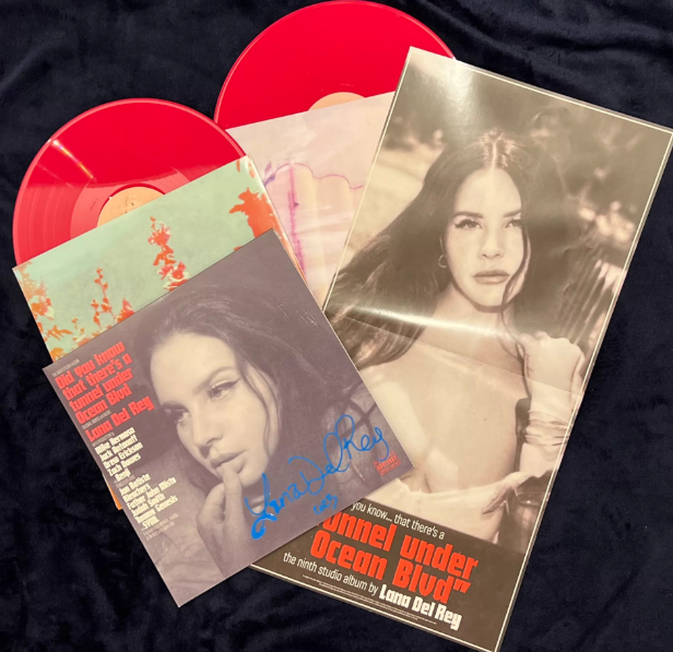 Lana Del Rey – Did You Know That There's A Tunnel Under Ocean Blvd signed red vinyl LP.