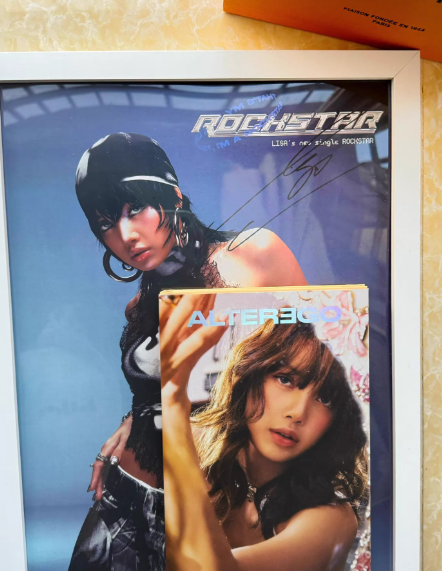 Lisa (BLACKPINK) - Rockstar Signed Poster + Alter Ego Photo Card (Limited Edition)