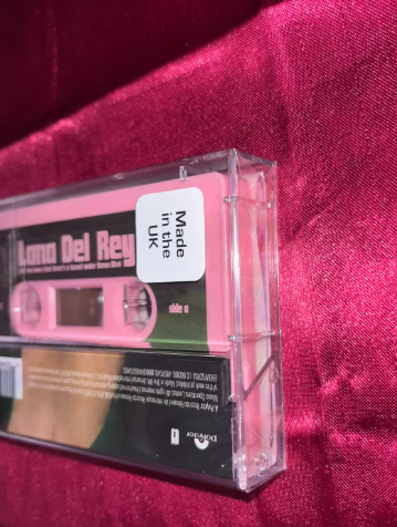 Lana Del Rey - Did You Know That There's a Tunnel Under Ocean Blvd Pink Shell Cassette Tape (UK Version)