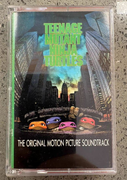 Teenage Mutant Ninja Turtles – Original Motion Picture Soundtrack Orange Cassette