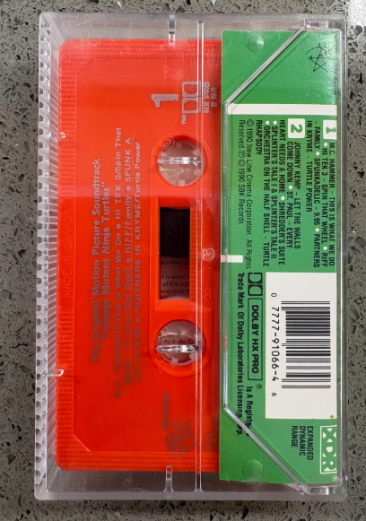 Teenage Mutant Ninja Turtles – Original Motion Picture Soundtrack Orange Cassette