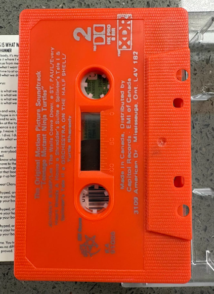 Teenage Mutant Ninja Turtles – Original Motion Picture Soundtrack Orange Cassette