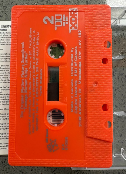Teenage Mutant Ninja Turtles – Original Motion Picture Soundtrack Orange Cassette
