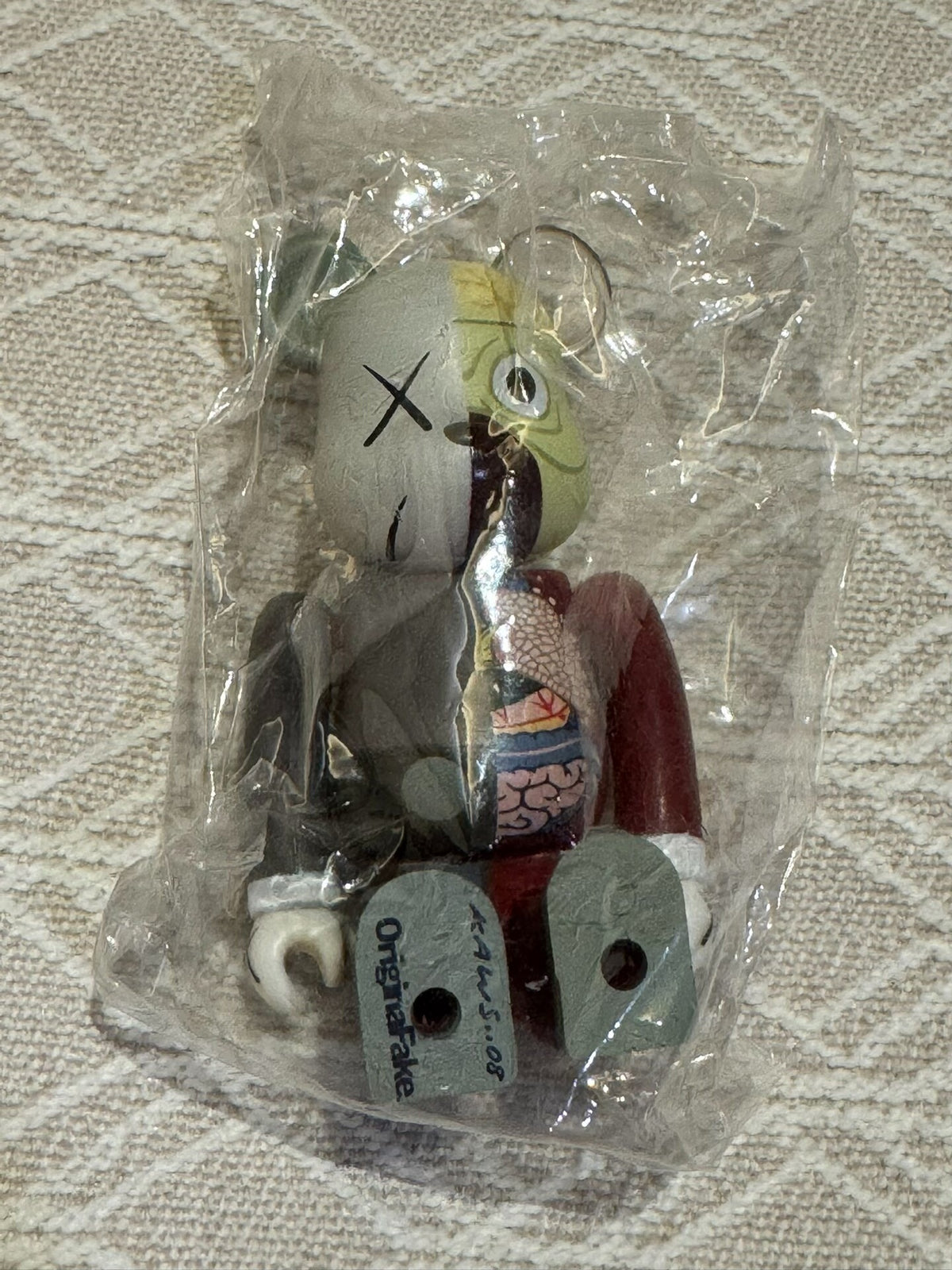 BE@RBRICK × KAWS OriginalFake Companion 100% – Red Dissected — original seller image
