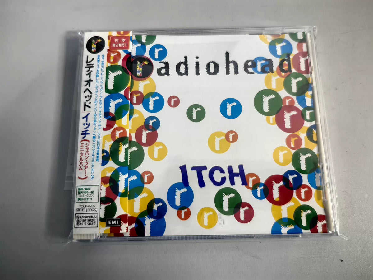 Radiohead – Itch – Japanese CD EP with OBI – actual item photograph 1