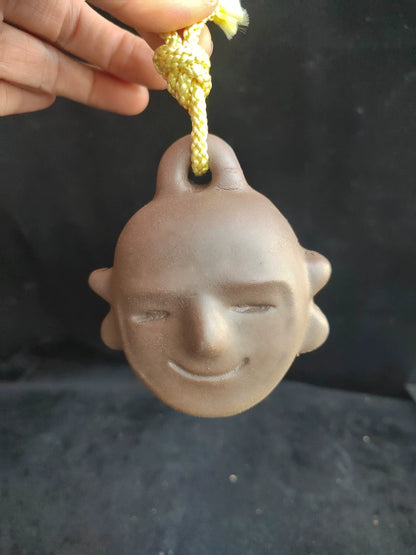 Terracotta Face Bell – Decorative Ceramic Object – photo 1