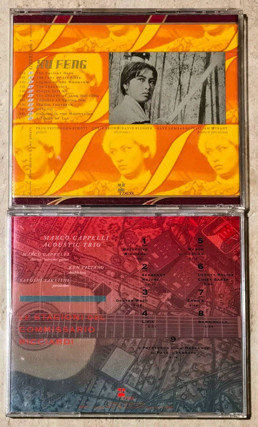 John Zorn / Marco Cappelli Acoustic Trio – Xu Feng + Le Stagioni del Commissario Ricciardi – 2CD Bundle