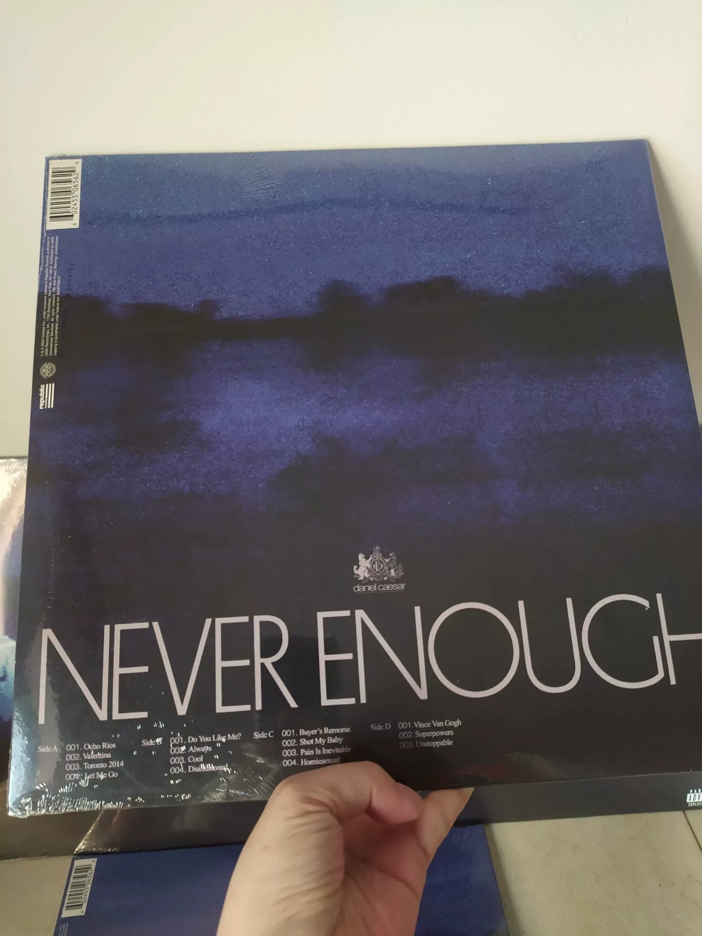 Daniel Caesar – Never Enough Orange Vinyl LP