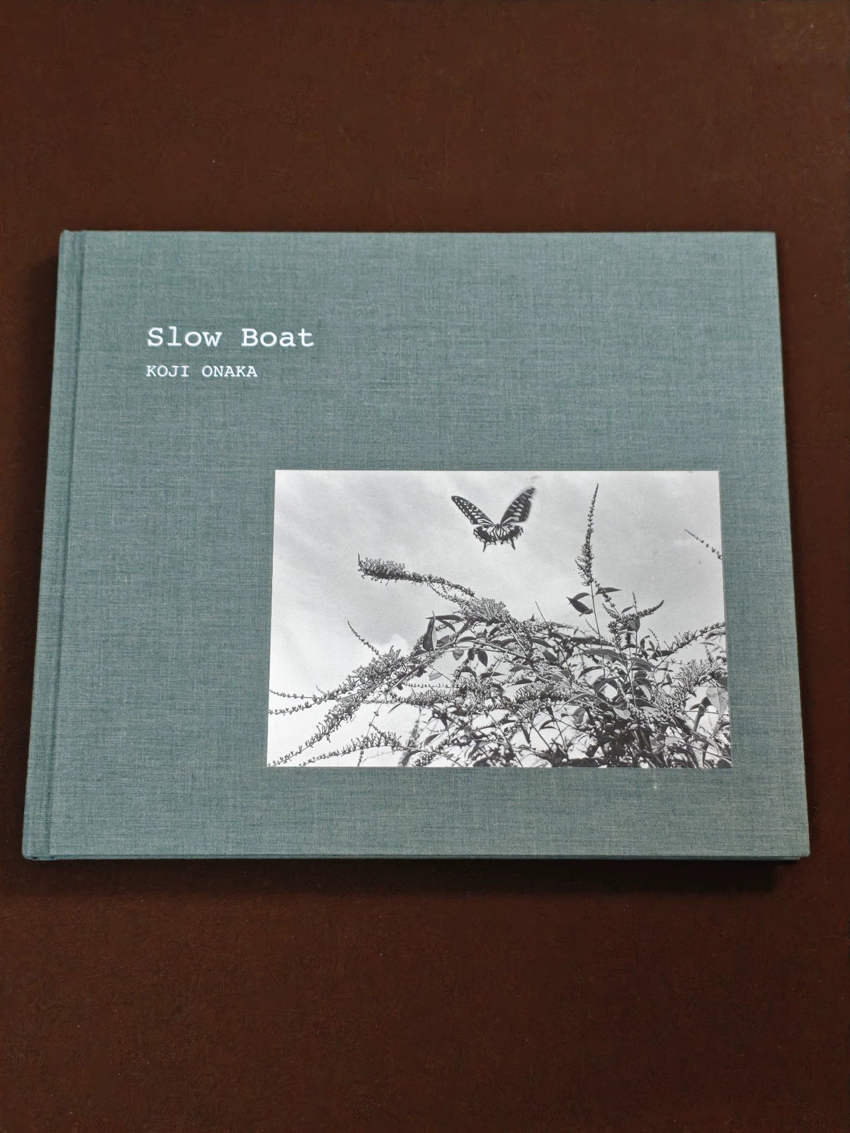 Koji Onaka – Slow Boat Signed Photography Book — front view