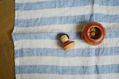 Kokeshi with Five Miniature Spinning Tops, Seller-Attributed to Eiji Aida – source photo 4