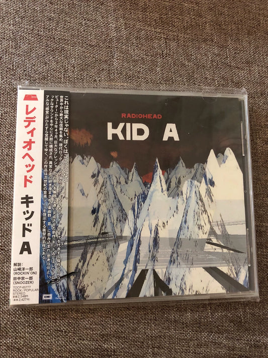 Radiohead – Kid A, Japanese CD with OBI and Shop Sticker – actual item photograph