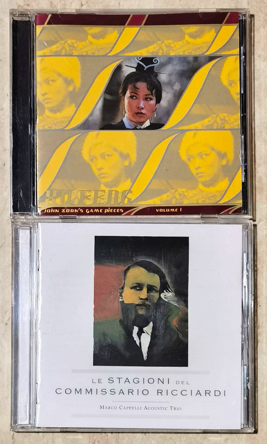 John Zorn / Marco Cappelli Acoustic Trio – Xu Feng + Le Stagioni del Commissario Ricciardi – 2CD Bundle