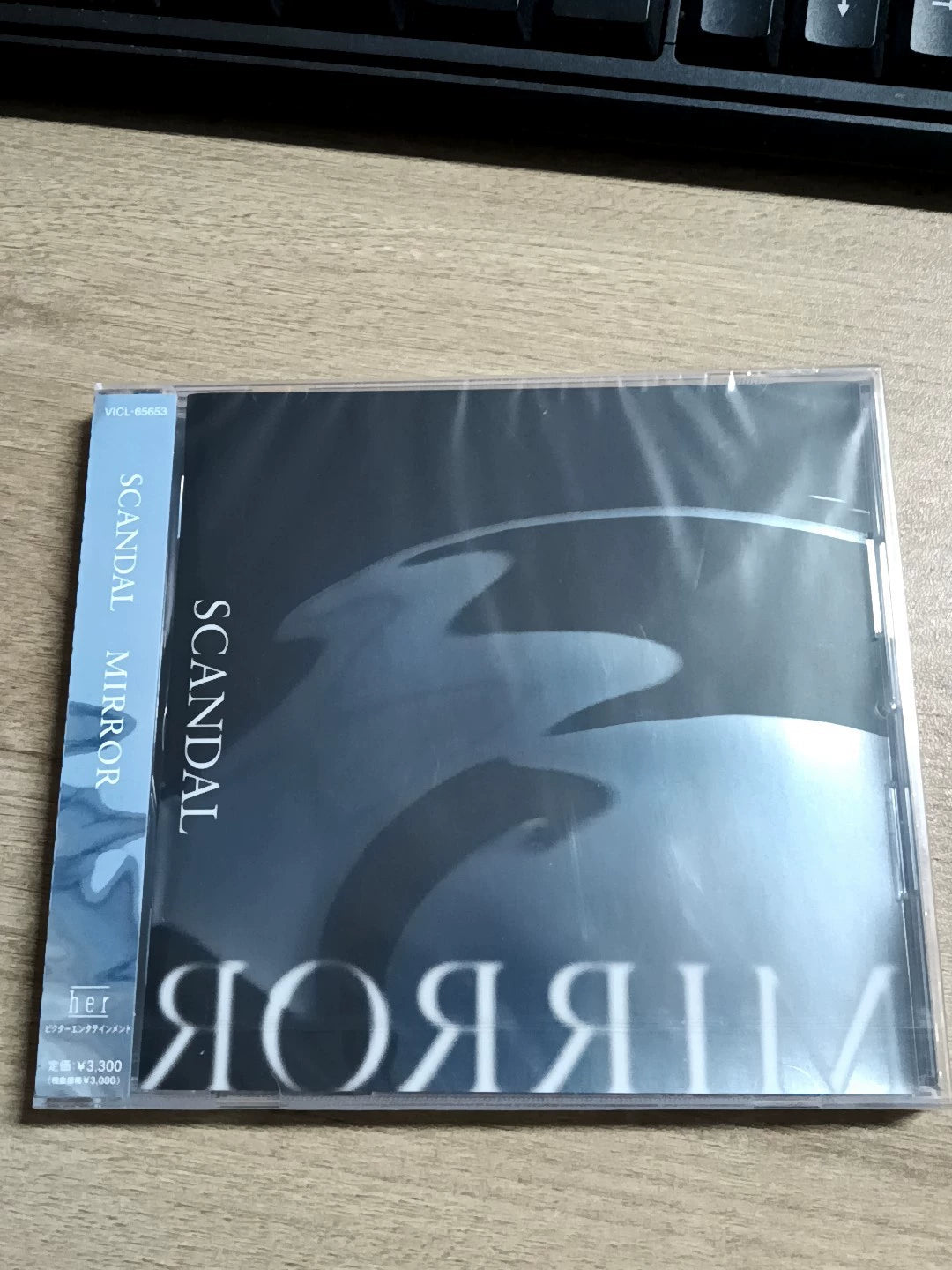 SCANDAL – Mirror – Japanese Promo CD with OBI – actual item photograph 1