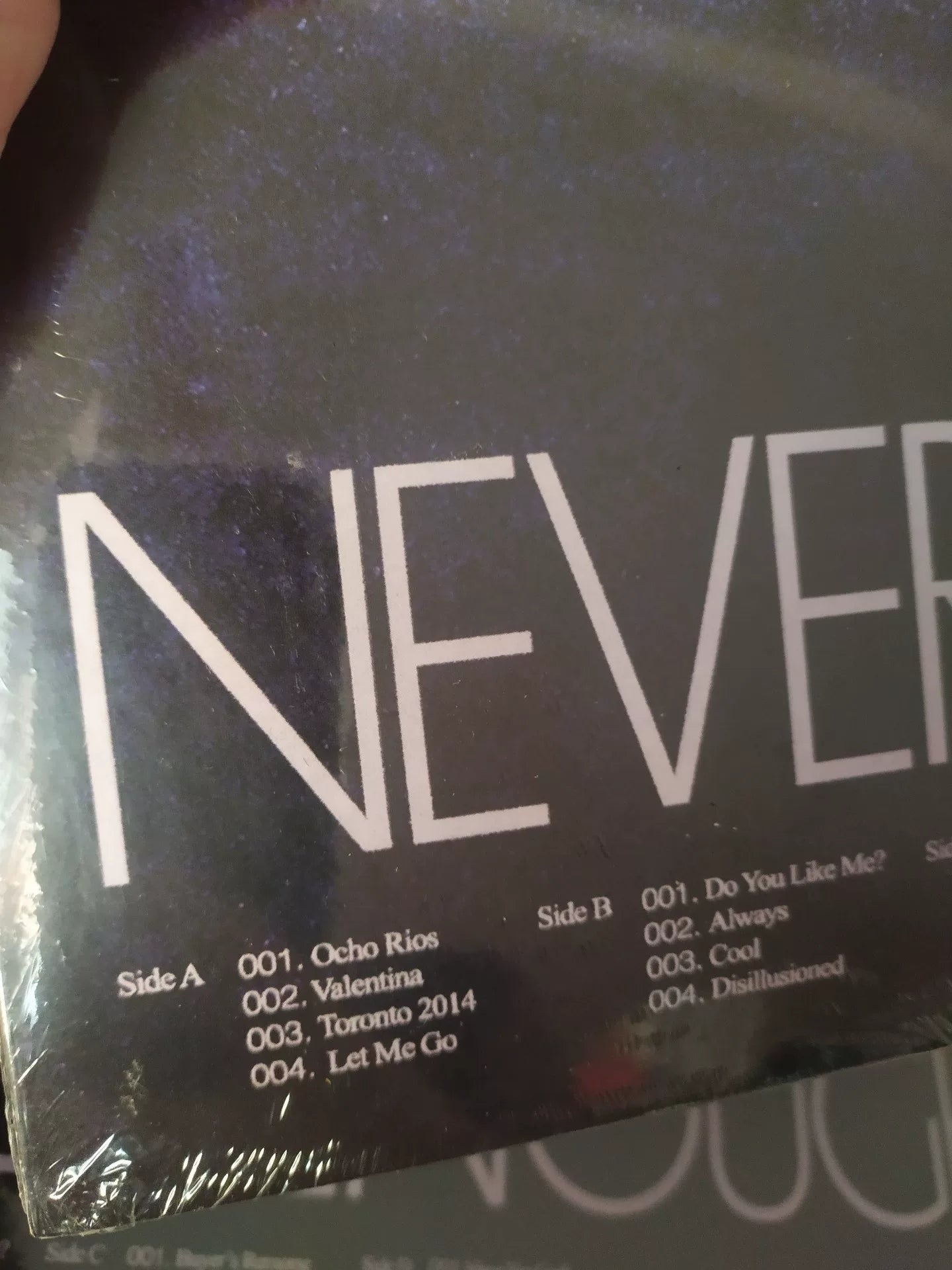 Daniel Caesar – Never Enough Orange Vinyl LP
