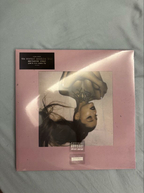 Pink-cover Thank U, Next tour edition, clear still from the original Live Photo