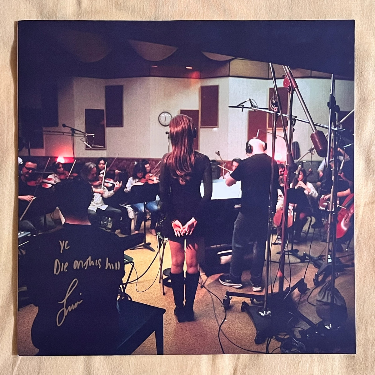 Seller photograph: Sienna Spiro — Visitor | Personalized Signed Red Vinyl