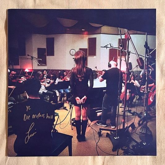 Seller photograph: Sienna Spiro — Visitor | Personalized Signed Red Vinyl